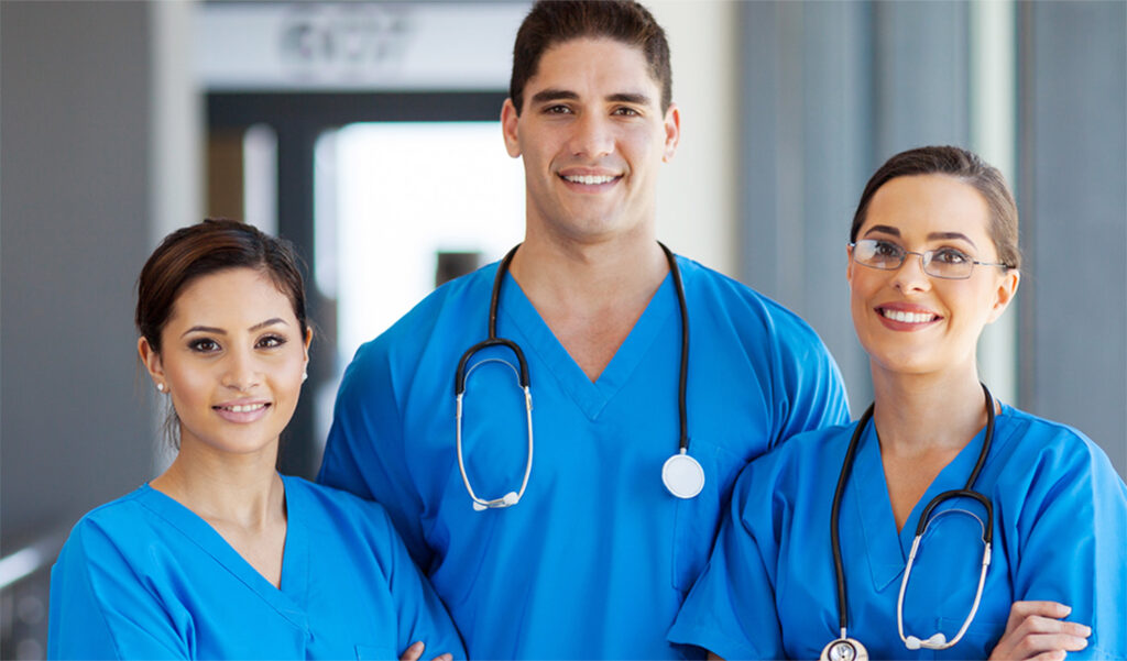 three doctors are posing for a picture together