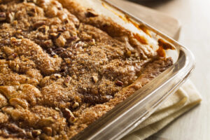 a close up of a coffeecake in a dish on a table