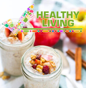 a couple of jars filled with food on top of a table